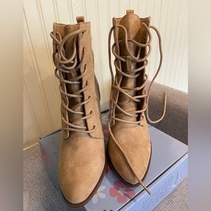 Tan short black heel boots. US size 8.5. Never worn